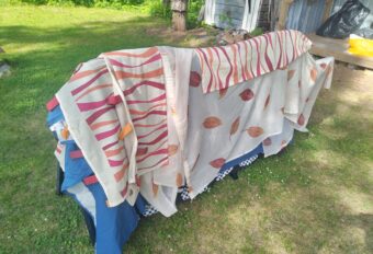 Large and small set of drawers, coffee table, carpets, curtains